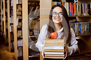 Concept of studying in the library, preparing for classes