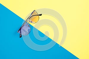 The concept of summer vacation. Top view on a sunglasses