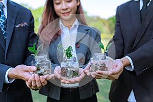 Concept of sustainable money growth investment with glass jar. Gyre