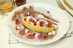 Concept of tasty dessert with banana, close up