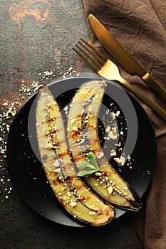 Concept of tasty dessert, grilled banana, top view