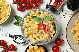 Concept of tasty eating with macaroni with cheese on white background