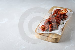 Concept of tasty food - sun-dried tomato, space for text