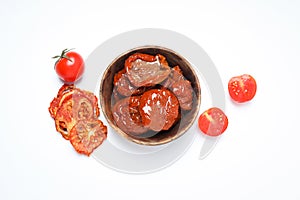 Concept of tasty food - sun-dried tomato, top view
