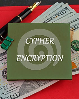 The concept of technology . The conceptual text of CYPHER ENCRYPTION written on a sticker on the background of dollar photo