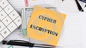 The concept of technology . The conceptual text of CYPHER ENCRYPTION it is written on a sticker on the background of an photo