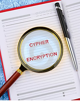 The concept of technology and development. The CYPHER ENCRYPTION concept phrase in the business notebook. Copy space photo
