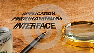 The concept of technology and development. Phrase, words, text APPLICATION PROGRAMMING INTERFACE text API written on