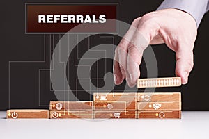 The concept of technology, the Internet and the network. Businessman shows a working model of business: Referrals