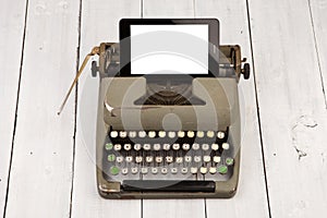 Concept of technology progress - old typewriter and new tablet p