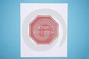 Concept of Tenants Stop Eviction signage printed on grunge textured paper