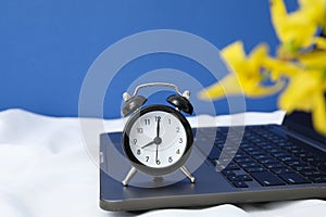 Concept of time management with alarm clock