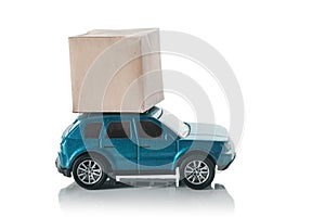 Concept of a transport delivery service. Car with a box on the roof, isolated on a white background