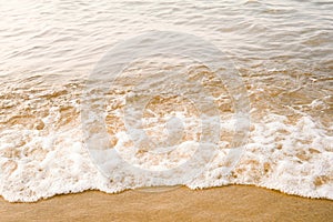 The concept of travel and rest at the seaside, sea waves on the background of the shoreline