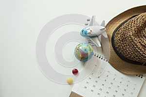 Concept of travel vacation trip and long summer weekend planning on calendar white table background