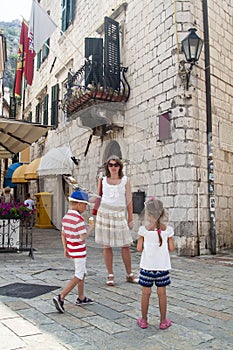 concept of travelling with children. beautiful woman holding a t