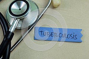 Concept of Tuberculosis write on sticky notes isolated on Wooden Table