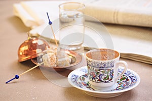 Concept of turkish coffee. Turkish delight on authentic plate