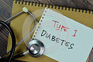 Concept of Type 1 Diabetes write on sticky notes with Stethoscope isolated on Wooden Table