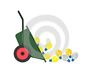 The concept of useless unrealized ideas and startups. Many glowing and extinct bulbs are thrown out of the garden wheelbarrow.