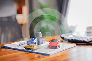 Concept of using an auto loan to buy car involves various financial considerations, such as insurance, banking services, and photo