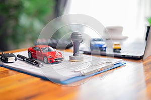 Concept of using an auto loan to buy car involves various financial considerations, such as insurance, banking services, and photo