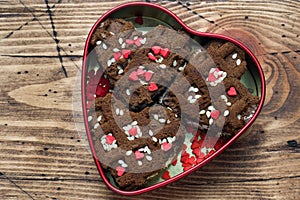 Concept Valentine`s Day. Chocolate chip cookies on a wooden table. Greeting card. Copy space