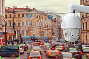 The concept of video surveillance and security technology. The surveillance camera tracks violators of traffic rules during