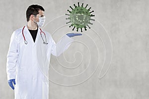 Concept of a virus hanging over the doctor`s hand photo