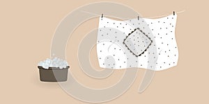 Concept of washing and drying: washed cute white duvet cover with brown polka dots.Blanket cover hanging on clothesline and it is