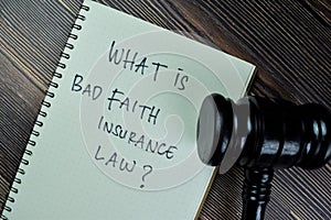 Concept of What is Bad Faith Insurance Law? write on a book with gavel isolated on Wooden Table