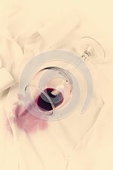 Concept, Wine glass, spilled, on a white shirt, no people, horizontal, top view,