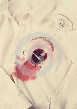 Concept, Wine glass, spilled, on a white shirt, no people, horizontal, top view,
