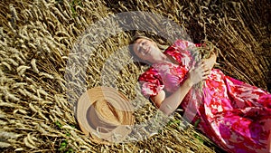 Concept of women's dreams and thoughts in a field in nature.