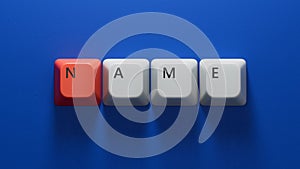 concept word name on Computer keyboard keys.close up of Computer keyboard keys
