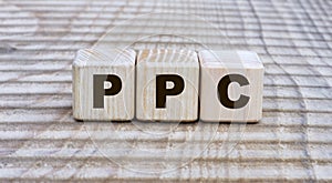 Concept of the word PPC on cubes on a beautiful background