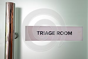 Concept of the word Triage Room at the emergency entrance of hospital photo