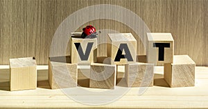 Concept of the word VAT on cubes