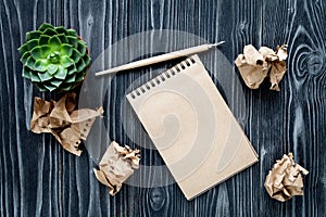 Concept of writer desktop wooden background top view mock up