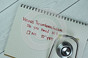 Concept of Yes, Venous Thromboembolism write on sticky notes isolated on Wooden Table