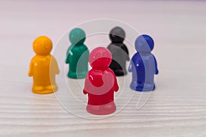 Conception - lidership, leader in a team, diversity, game figures or pawns in a business situation.