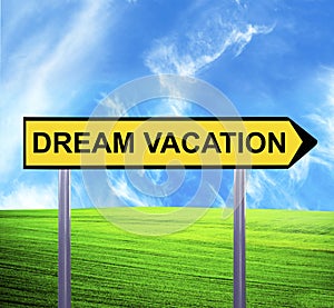 Conceptual arrow sign against beautiful landscape with text - DREAM VACATION