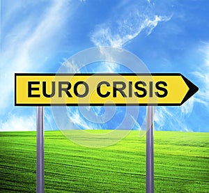 Conceptual arrow sign against beautiful landscape with text - EURO CRISIS