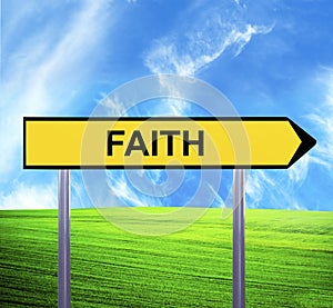 Conceptual arrow sign against beautiful landscape with text - FAITH