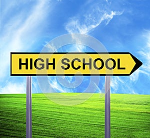 Conceptual arrow sign against beautiful landscape with text - HIGH SCHOOL