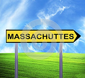 Conceptual arrow sign against beautiful landscape with text - MASSACHUTTES photo