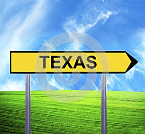 Conceptual arrow sign against beautiful landscape with text - TEXAS