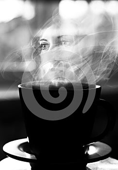 Conceptual art. Black and white. Surrealist Cup with the landscape. Double exposure of beautiful girl.