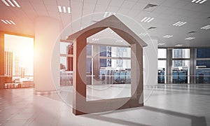 Conceptual background image of concrete home sign in modern office interior