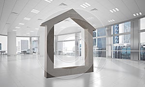 Conceptual background image of concrete home sign in modern office interior